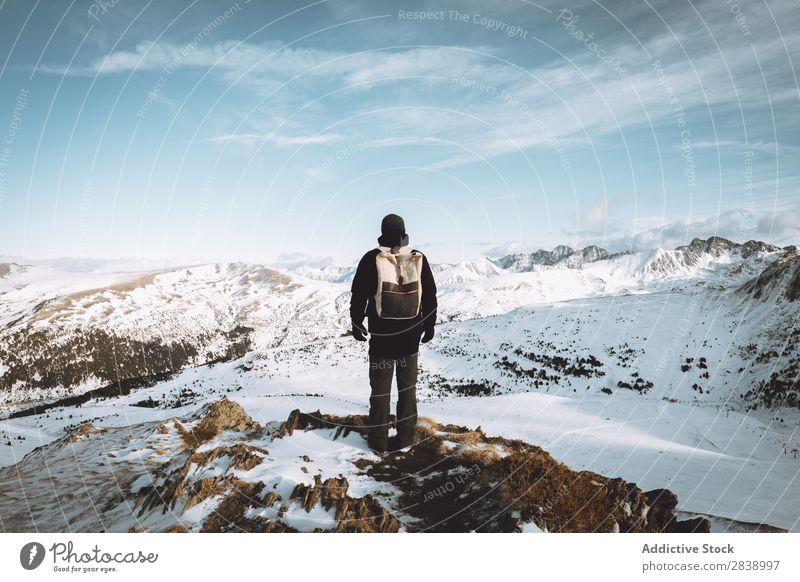 Tourist with backpack in mountains Human being Backpack Winter Hill Mountain Snow Landscape Nature White Ice Seasons Cold Vacation & Travel way Frost Freeze