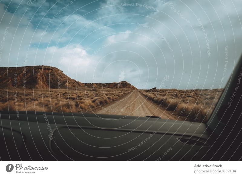 Road view from a car Hill Mountain Nature Street Dry Car Dashboard Vantage point Perspective Landscape Vacation & Travel Desert Landing Grass Sand Ground