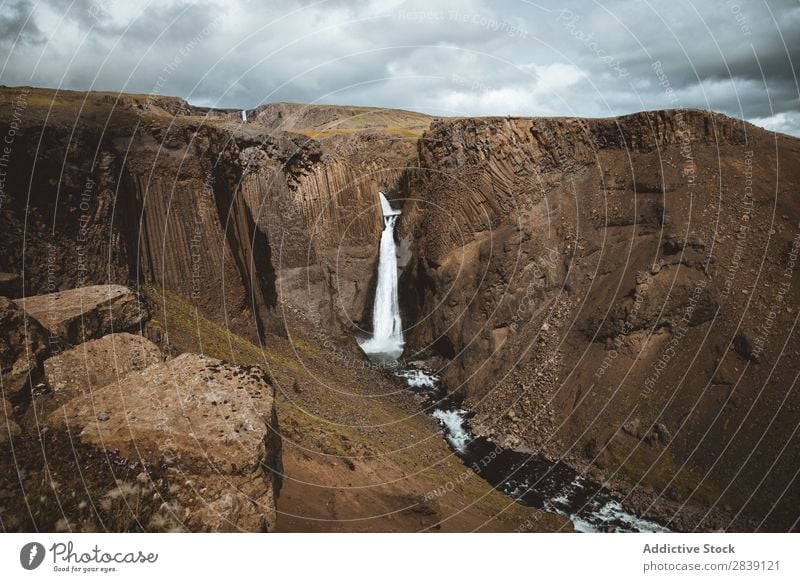 Waterfall in rocky canyon Landscape Rock Islandia Canyon Flow Wilderness cascade falling Nature Fresh Beauty Photography Iceland Environment Tourism