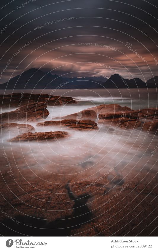 Rocks in water of sea Island darkness Landscape Elgol Majestic Dramatic Isla de Skye Escocia Nature Magic Coast Mysterious Water Vacation & Travel Scene