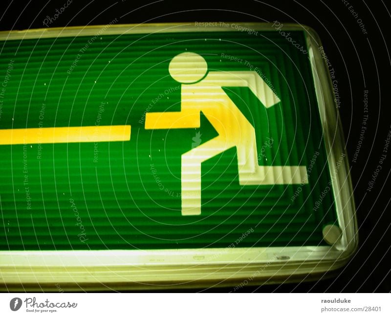 Always on the run Emergency exit Underground garage Neon sign Way out Living or residing Macro (Extreme close-up)