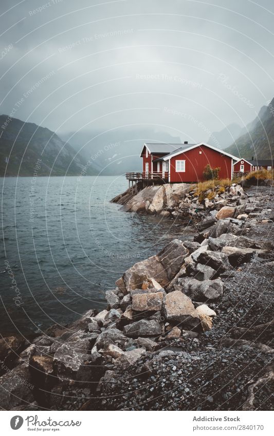 Village on rocky shore. Hamnoya Rock Coast Mountain Landscape Remote Nature Vacation & Travel Tourism Horizon Panorama (Format) Destination Natural Valley