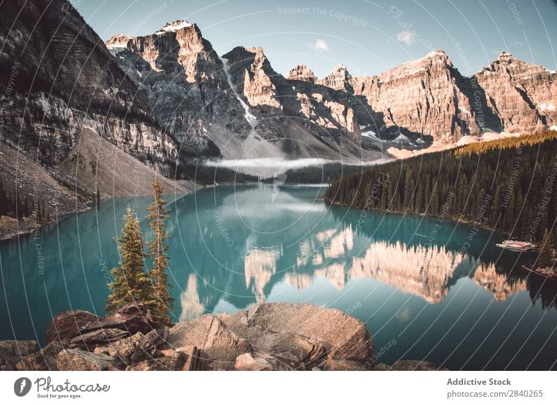 Lake Moraine, snowy mountains Mountain snows Basin Tourism Reflection Landscape Blue Mirror Panorama (Format) Surface Nature Valley Snow Sky Majestic