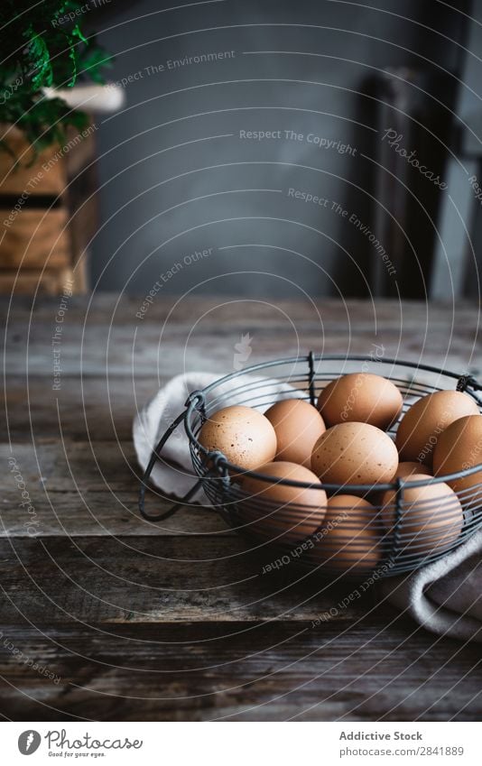 Eggs in net bowl Bowl Raw Food Ingredients Healthy Protein Breakfast Chicken Fresh Organic Eggshell Natural Fragile Cooking Net Wood Timber Kitchen Deserted Set