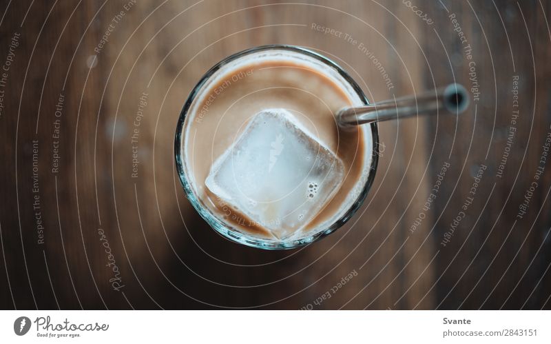 Top view of iced coffee Beverage Cold drink Coffee Latte macchiato Glass Straw Shopping Berlin Cool (slang) Joy Iced coffee Breakfast Ice cube Wooden table