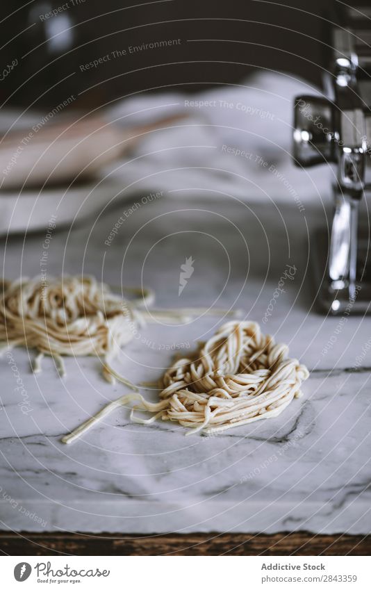 Raw pasta on marble background Pasta Accumulation Food Ingredients Meal Healthy Cooking Italian Wheat Diet Lunch Dinner Heap noodle Tradition Vegetarian diet