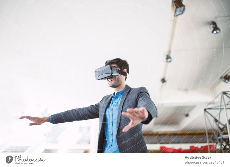 Man watching virtual reality glasses. Technology tech Cyber brunet Head Display Playing realistic Gadget handsome Person wearing glasses Intellect