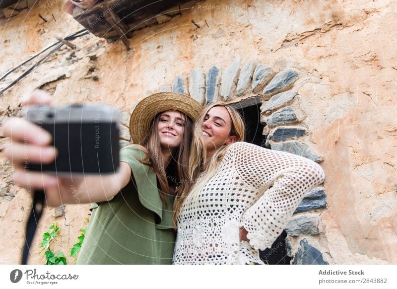 Women friends taking selfie Woman tourists Friendship Together Camera Selfie making faces grimacing Vacation & Travel Lifestyle Youth (Young adults) Happy