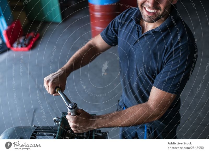 Mechanic fixing a compressor engine Repair Employees &amp; Colleagues Industrial Engines disassembling wrench Bolt Maintenance Workshop Industry Inspection
