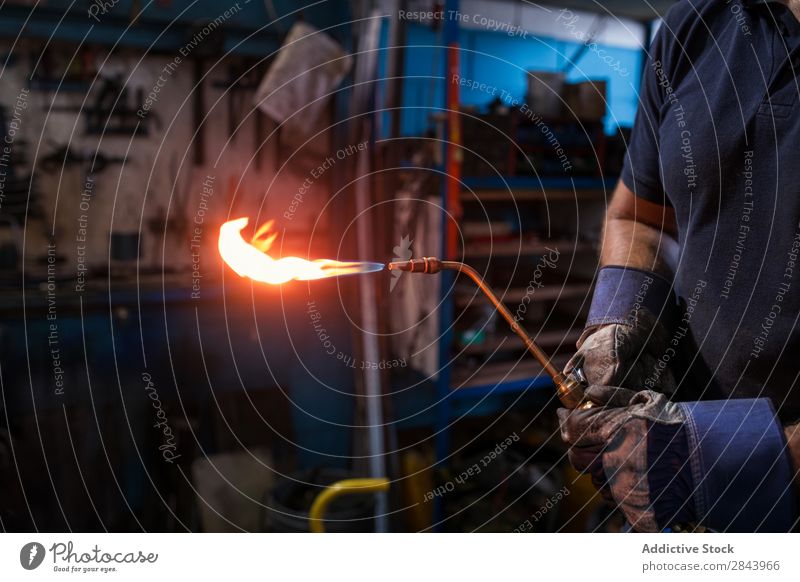 worker welding Employees &amp; Colleagues Welding metalworking Welder oxyacetylene Flame Pipe Mask Metal Bright Equipment Garage Construction Industry Steel