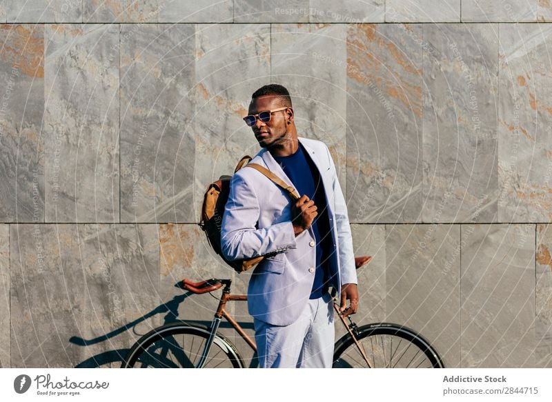 Trendy man with bicycle at street Man Fashion Town Self-confident Bicycle Formal Street Black Businessman Stand vogue African commuting Elegant Transport Wear