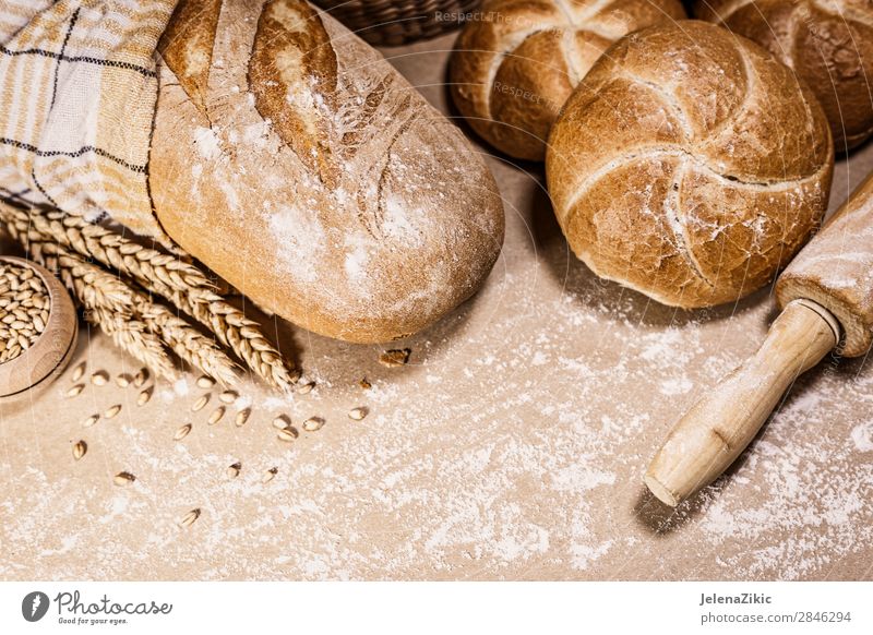 Fresh bread and wheat on a rustic background Food Dough Baked goods Bread Nutrition Eating Breakfast Lunch Dinner Buffet Brunch Organic produce Healthy Eating