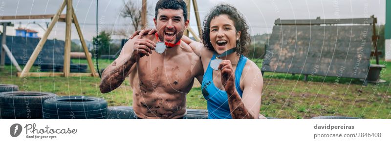 Athletes showing medals after race Happy Playing Feasts & Celebrations Sports Success Internet Human being Woman Adults Man Couple Hand Smiling Laughter