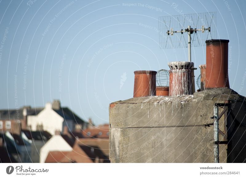 Clay chimney pots House (Residential Structure) Antenna aerial Sky Architecture Roof Chimney Bird Blue Red Variety rooftop droppings vent poop roofscape