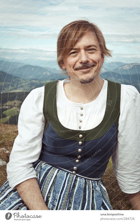 There's koa sin on that mountain pasture Man Adults 1 Human being 30 - 45 years Environment Nature Landscape Meadow Alps Mountain Peak Dress Traditional costume
