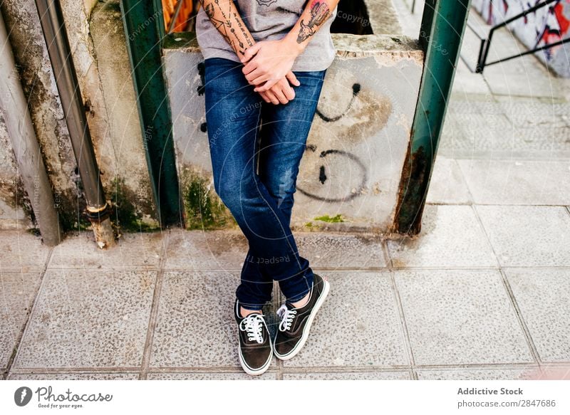 Crop hipster posing on street Man Town Hipster Posture Summer millennial Tattooed Self-confident Style City Youth (Young adults) Clothing Easygoing Street