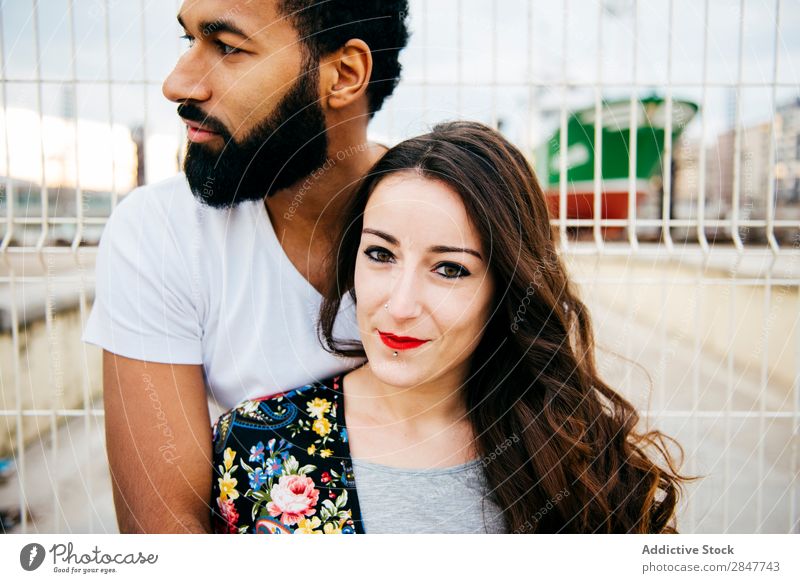 Beautiful multiracial couple Couple Town loving Embrace Relationship multiethnic embracing Affectionate Beauty Photography Exterior shot valentine Street Modern