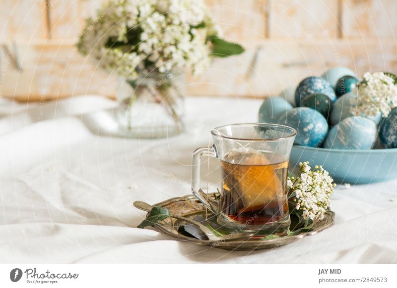 Naturally dyed Easter blue eggs, and tea cup, Food Breakfast Beverage Tea Plate Cup Mug Beautiful Decoration Feasts & Celebrations Flower Blue Green White