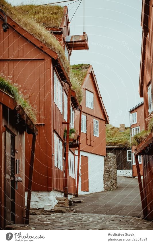 Wooden house painted in white and brown House (Residential Structure) Rural Exterior Building residential Tradition White Village Cottage Home Old Landscape