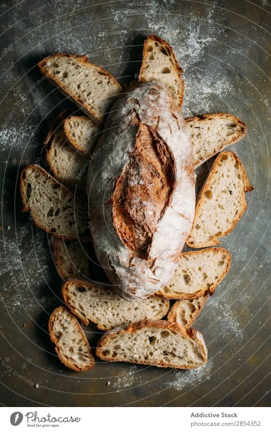 Rustic bread loaf on dark background Baking Bakery Bread Breakfast carbohydrate Dark Flour Food home-baked Home-made Seed types Wheat wholemeal