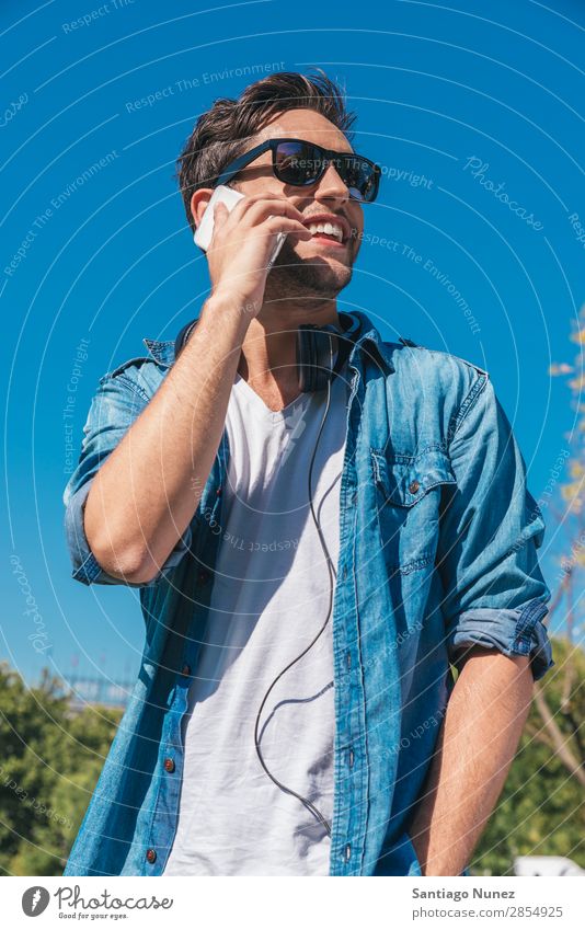 Urban smart casual handsome young man talking on smartphone. Adults Attractive Beautiful Beauty Photography To call someone (telephone) Easygoing Caucasian