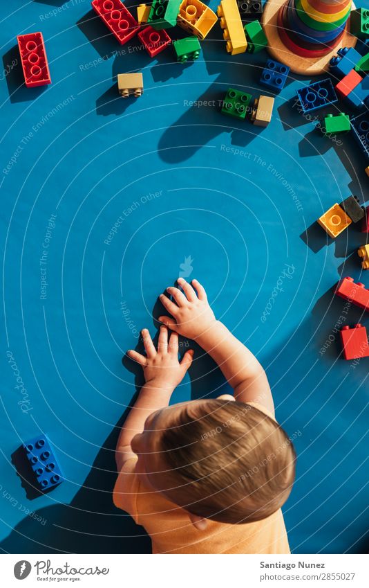 Happy baby playing with toy blocks. Baby Playing childcare Kindergarten School Toys Toddler Boy (child) Small Child Considerate Story Cute Joy Preschool