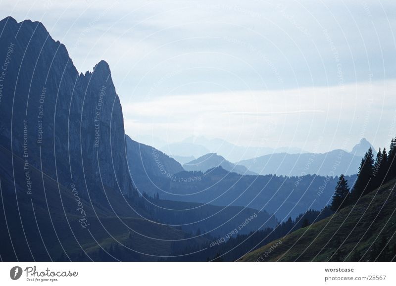 Mountains in the haze Switzerland Canton Glarus Horizon Fog Perspective Blue