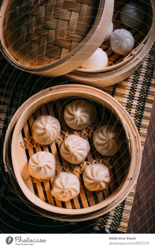Homemade dumplings in a bamboo steamer Appetizer asian Bamboo Roll China Chinese Dough Dumpling Food Fresh Healthy Home-made Hot Meal Pork Snack soy Steamed