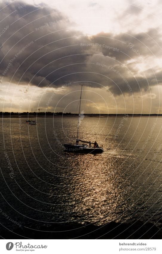 Sailing yacht in the evening sun Sport boats Yacht Sailboat Sailing ship Ocean Clouds Light Moody Watercraft Sun Reflection Evening Howth