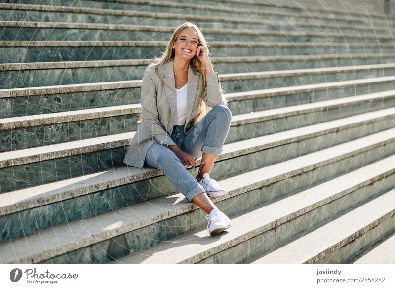 Beautiful young blonde woman smiling on urban steps. Lifestyle Style Happy Hair and hairstyles Human being Feminine Young woman Youth (Young adults) Woman