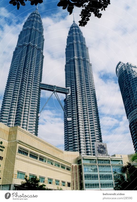 Petronas Towers with Suria KLCC Petronas Twin Towers Malaya Kuala Lumpur Steel Building High-rise Architecture Level Bridge Point Upward Skyward Famous building
