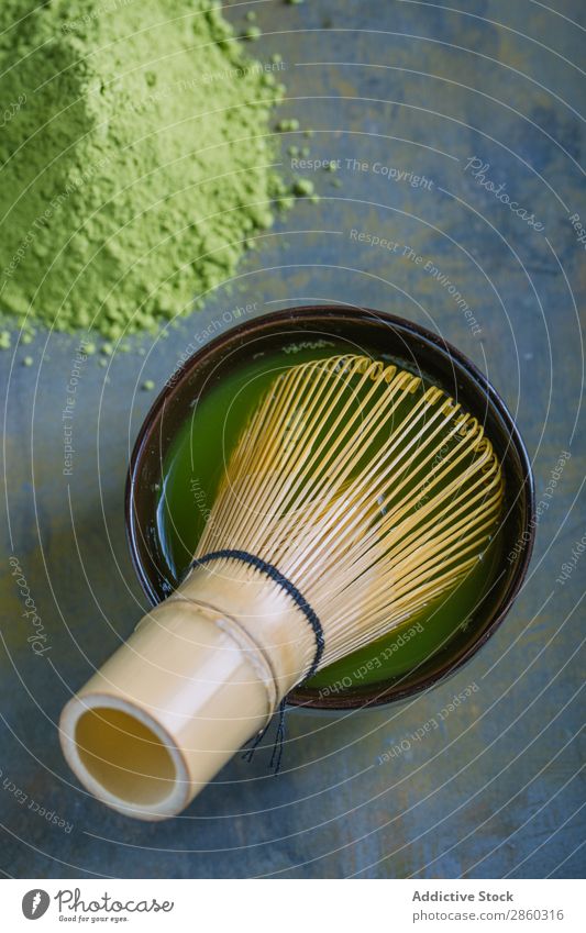 Preparing matcha tea with bamboo whisk Bamboo Beverage brew Green Healthy Japanese Powder Tea Beater