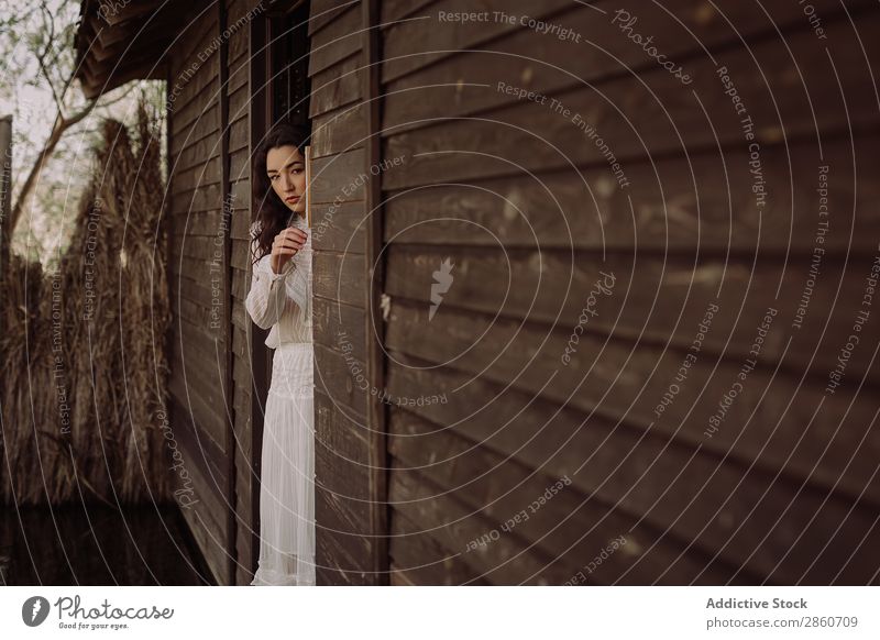 Dreaming model in white leaning wall Woman Rustic Dress Vintage Rural House (Residential Structure) Clothing Style Loneliness Old fashioned Wall (building)