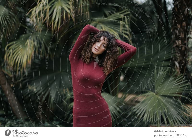 Beautiful model in dress against green Woman Beauty Photography Dress Palm of the hand To enjoy Brunette Athletic Hands up! Curly Charming Body Elegant Posture