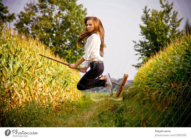 Wicked witch on mission! Feminine Young woman Youth (Young adults) 1 Human being Plant Cloudless sky Summer Autumn Tree Grass Maize Maize field Maize plants