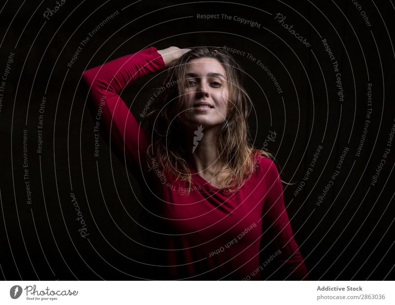 Young woman dancing in darkness Ballet Dance Ballerina red dress Dress Woman Performance Room Red Elegant Dark Art pose Shows Smock obscurity grace Gymnastics