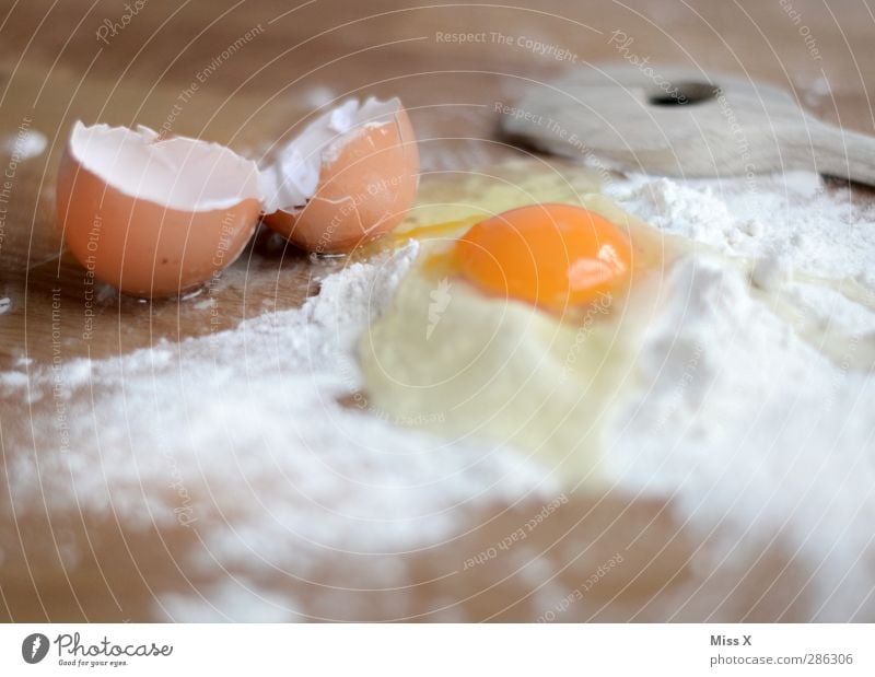 dough Food Dough Baked goods Nutrition Delicious Egg Wooden spoon Eggshell Flour Albumin Yolk Cooking Christmas biscuit pasta dough Wooden table Ingredients