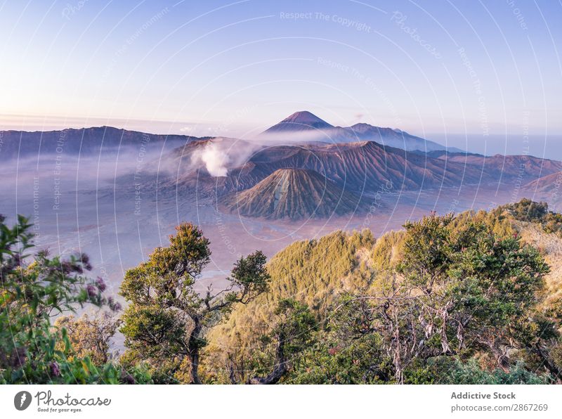 Amazing view of high mountains and blue sky Mountain Volcano Sky Clouds mount bromo java island Indonesia Picturesque Vantage point Blue Height Heaven Landscape