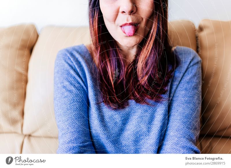 close up portrait of a young woman with tongue out Joy Happy Beautiful Face Make-up Profession Human being Feminine Young woman Youth (Young adults) Woman