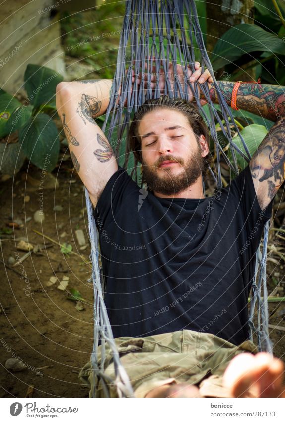 power napping Man Human being 20-30 years Lie Hammock Sleep Eyes Closed Facial hair Beard European Caucasian Bird's-eye view Nature Exterior shot Forest