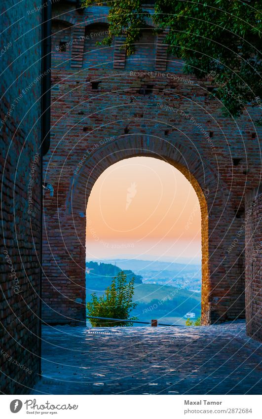 Sunset Through an Arch Tourism Landscape Castle Building Monument Stone Old Historic Europe Gradara Italy Marche Ancient brick entrance Way out fort fortress