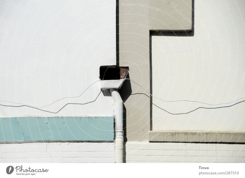 Happy birthday, Photocase! / Connections Small Town Wall (barrier) Wall (building) Facade Bright Blue Gray Conduit Cable Graphic Subdued colour Exterior shot