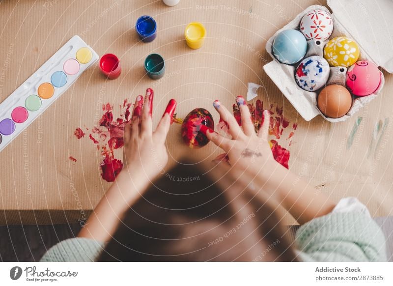 Child with dirty hands near chicken eggs and colors at table Hand Easter Egg Dirty Painting (action, artwork) Palm of the hand Table Chicken Container Colour