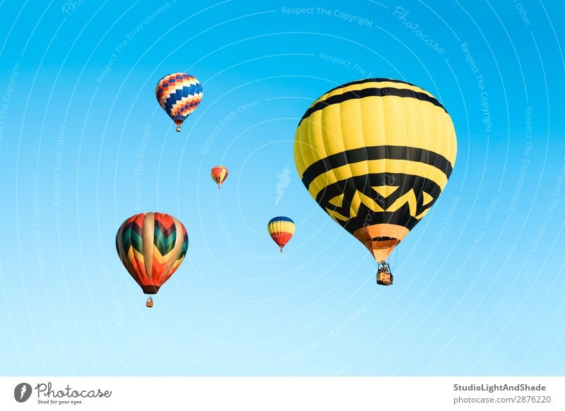 Colorful hot air balloons in the blue sky Joy Leisure and hobbies Vacation & Travel Adventure Freedom Sports Sky Transport Aircraft Hot Air Balloon Flying