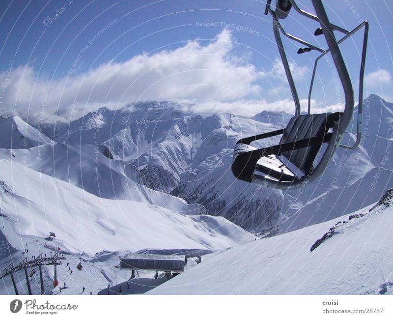 raised hide Winter vacation Deep snow Virgin snow Ischgl Armchair Chair lift Panorama (View) Alpine Sports Snow Mountain Alps powder Large
