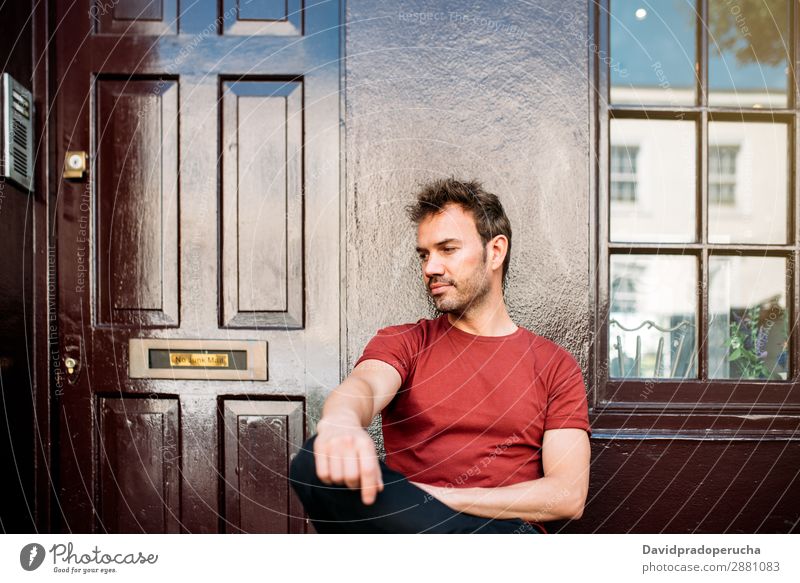 Man sitting in a bench on a beautiful maroon background Caucasian Building Youth (Young adults) Architecture Vintage Notting Hill decor Street Sit Summer