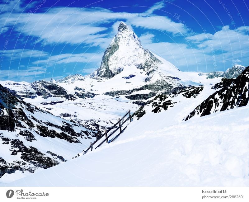 Matterhorn Winter Sports Winter sports Ski run Nature Landscape Sky Beautiful weather Snow Alps Mountain Peak Snowcapped peak Glacier Cold Zermatt Footprint