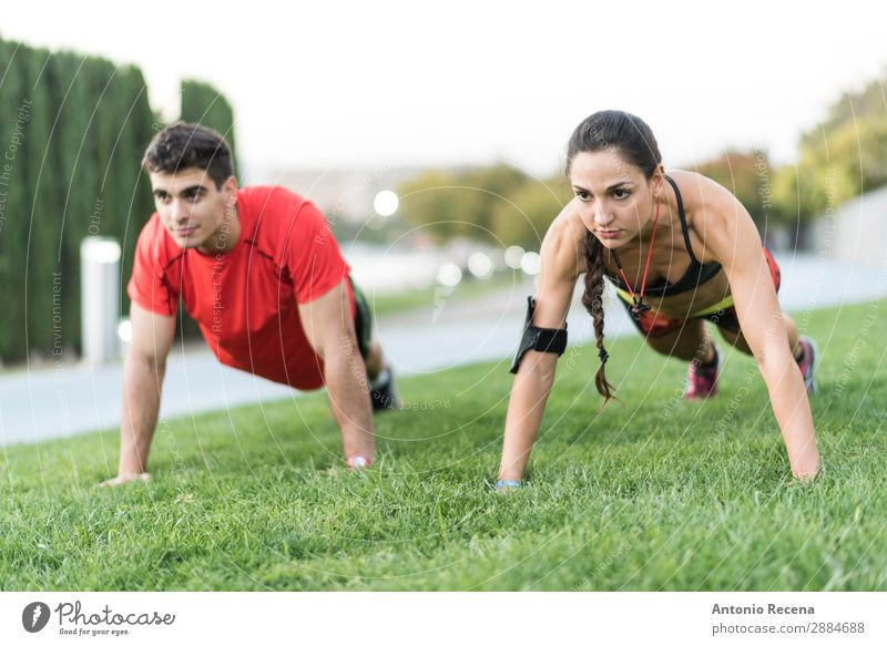 City training Sports Sportsperson Human being Woman Adults Man Couple 2 18 - 30 years Youth (Young adults) Brunette Fitness Strong Effort push ups Runner