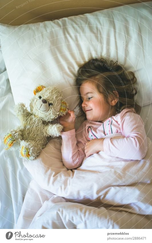 cute baby girl with teddy bear