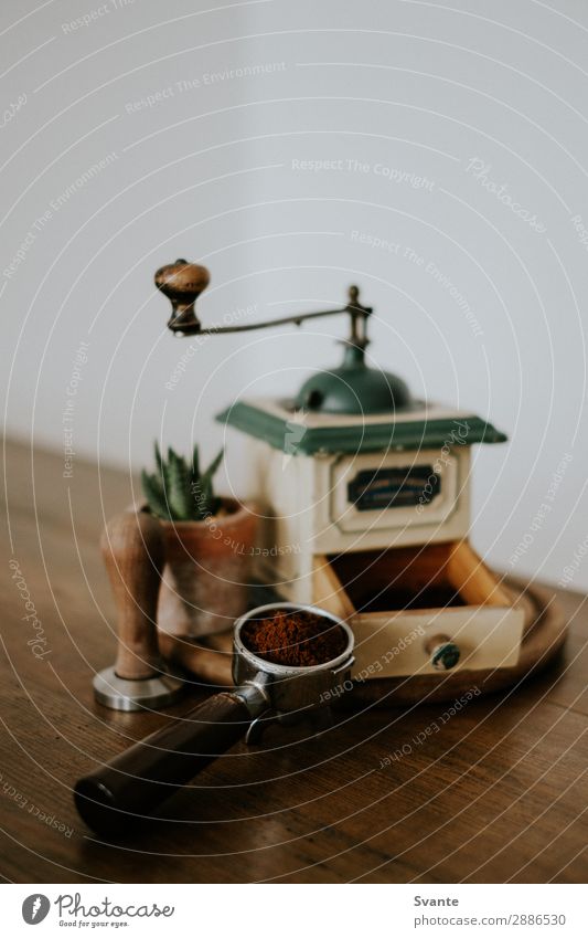 Old coffee grinder and portafilter on wooden table To have a coffee Hot drink Coffee Espresso Lifestyle Elegant Style Design Berlin Germany Esthetic Authentic